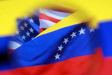 Illustration shows U.S. and Venezuelan flags