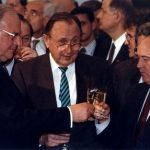 FILE PHOTO: File photo of Helmut Kohl toasting with former