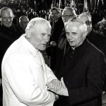 FILE PHOTO: Pope John Paul II welcomes Cardinal Joseph Ratzinger