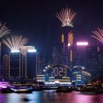 Fireworks explode over Victoria Harbour to celebrate the New Year