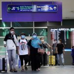 Travellers walk at Kuala Lumpur International Airport 2 (KLIA2) in