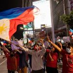 Supporters of presidential candidate Ferdinand “Bongbong” Marcos Jr., celebrate as