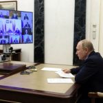 Russian President Vladimir Putin chairs a meeting on fighting wildfires,
