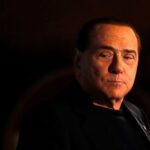 FILE PHOTO: Former Prime Minister Silvio Berlusconi looks on during
