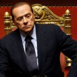 FILE PHOTO: Italian Prime Minister Silvio Berlusconi takes part in
