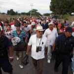 FILE PHOTO: Vigilante leader Hipolito Mora and other vigilantes walk