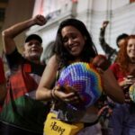 People celebrate after Brazil’s federal electoral court (TSE) barred former