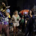 People celebrate as they gather after Brazil’s federal electoral court