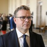 Finland’s Prime Minister Petteri Orpo talks to the media in