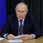 Russian President Vladimir Putin attends a meeting with the Pobeda