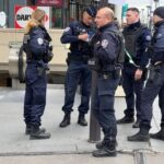 French police shoot woman after she uttered threats at train