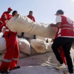 FILE PHOTO: Egyptian Red Crescent members coordinate aid for Gaza