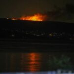 Fire rises near the Lebanese-Israeli border, seen from the port