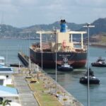 FILE PHOTO: Cargo vessels transit through the Panama Canal, on