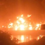 Fire burns after a blast at an oil terminal in