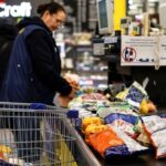 People shop at a Metro Cash and Carry hypermarket in