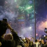 People celebrate New Year’s Eve at the Bundaran Hotel Indonesia