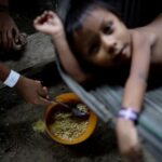 The Wider Image: Gold miners bring fresh wave of suffering