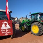 Swiss farmers and their tractors are seen during a protest