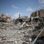 Buildings of Al-Aqsa University lie in ruin after it was