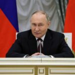 Russian President Putin chairs a meeting with members of the