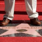 FILE PHOTO: Dabney Coleman stands on his star on the