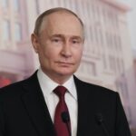 Russian President Putin attends press conference in Harbin