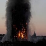 FILE PHOTO: Flames and smoke billow from the Grenfell Tower