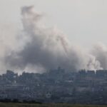 Smoke rises following an explosion in Gaza near the Israel-Gaza