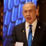 FILE PHOTO: Israeli Prime Minister Netanyahu addresses a ceremony marking