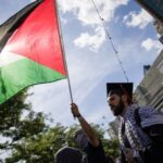 Pro-Palestinian protestors hold a rally in Brooklyn, New York