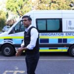 British Prime Minister Rishi Sunak watches an immigration raid in