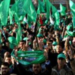 FILE PHOTO: Palestinian supporters of Hamas celebrate their victory in