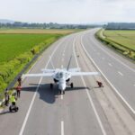 A Swiss Air Force F/A-18 fighter jet lands on the