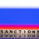 FILE PHOTO: Illustration shows letters arranged to read “Sanctions” in