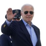 Biden boards Air Force One as he departs Washington for