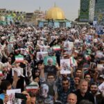 Supporters of Iranian presidential candidate Saeed Jalili attend a campaign