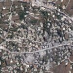 A satellite image shows damage in the Lebanese village of