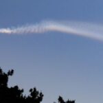 The contrail of North Korean missile is pictured from Yeonpyeong