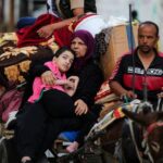 FILE PHOTO: Palestinians flee Rafah due to an Israeli military
