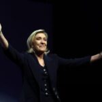 Marine Le Pen reacts after first round results of the