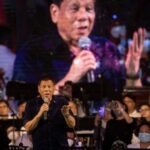 FILE PHOTO: Philippine President Rodrigo Duterte attends thanksgiving concert as