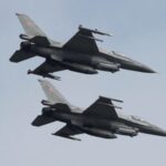 FILE PHOTO: Polish Air Force F-16 fighter jets fly in