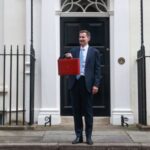 British Chancellor of the Exchequer Jeremy Hunt holds the budget