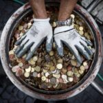 The Wider Image: What happens to the coins tossed into