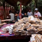 Hot meals are distributed during the holy month of Ramadan