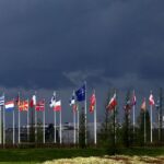 National flags of the Alliance’s members flutter at the NATO