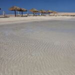 Umbrellas at Ras Hankorab beach at southern Egypt’s Red Sea