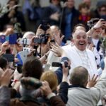 FILE PHOTO: Pope Francis waves at the end of the