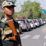 A Border Security Force (BSF) security personnel stands guard at